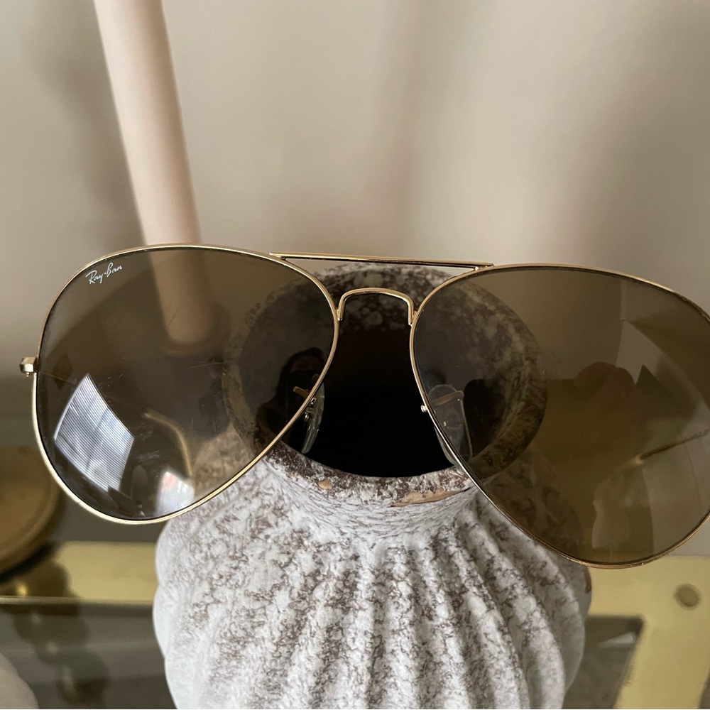 Ray-ban gold aviator sunglasses.